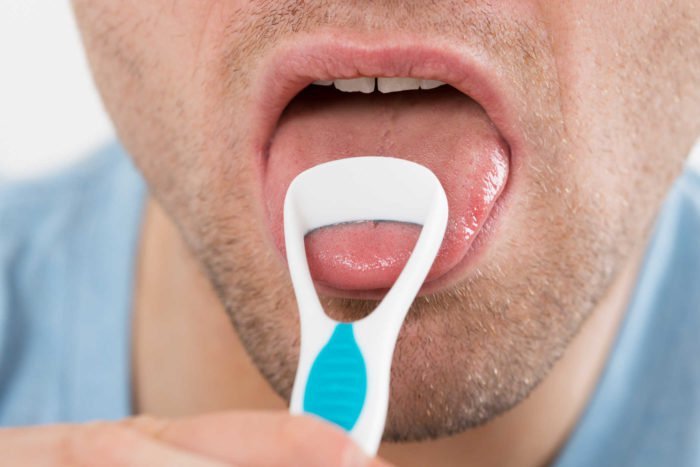 hvordan man renser tungen